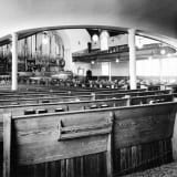 Interior view of the First Presbyterian Church in 1964. The image captures architectural details.