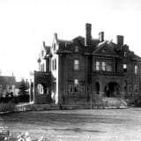 Exterior view of McDougall Mansion in Edmonton, showcasing its architectural features.