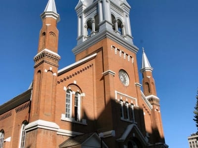 Front view of St. Joachim's Roman Catholic Church showcasing the tower in detail.