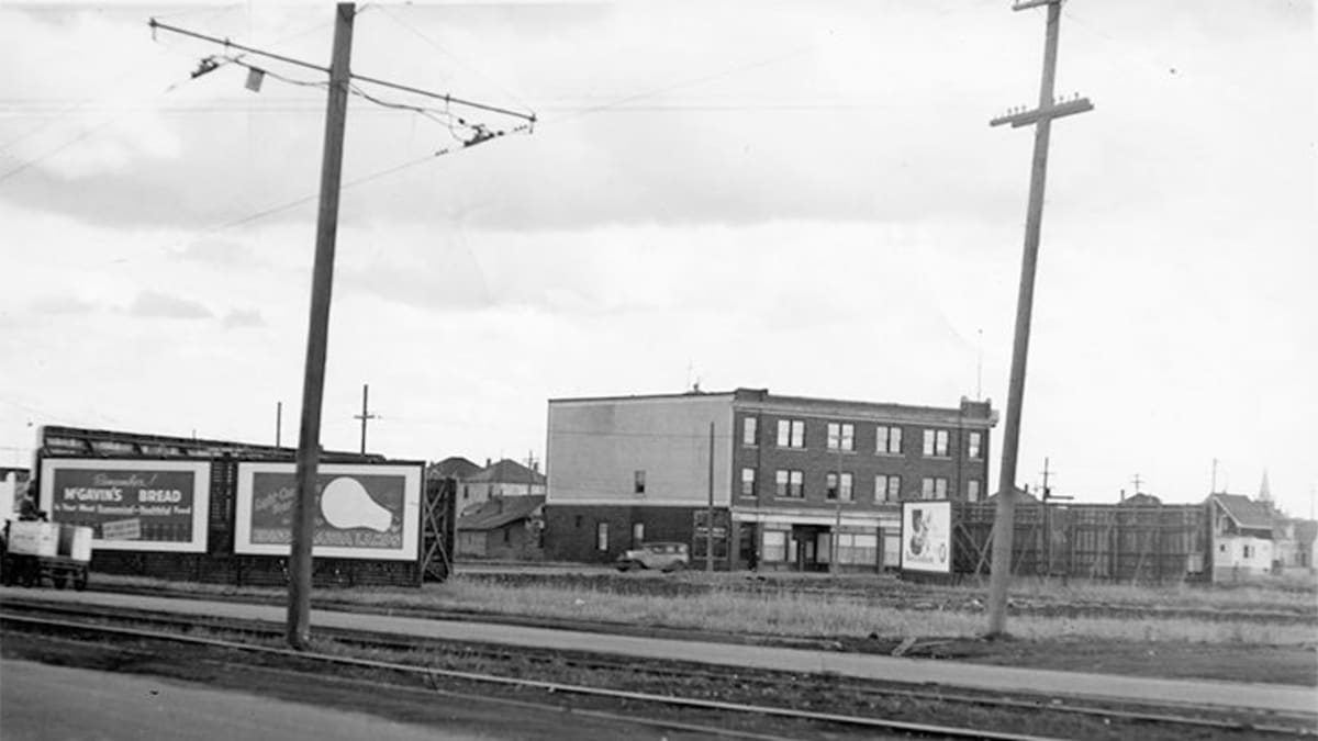 Photograph of the Lambton Block located at 111 Avenue and 97 Street in Edmonton, captured from the west in 1930.