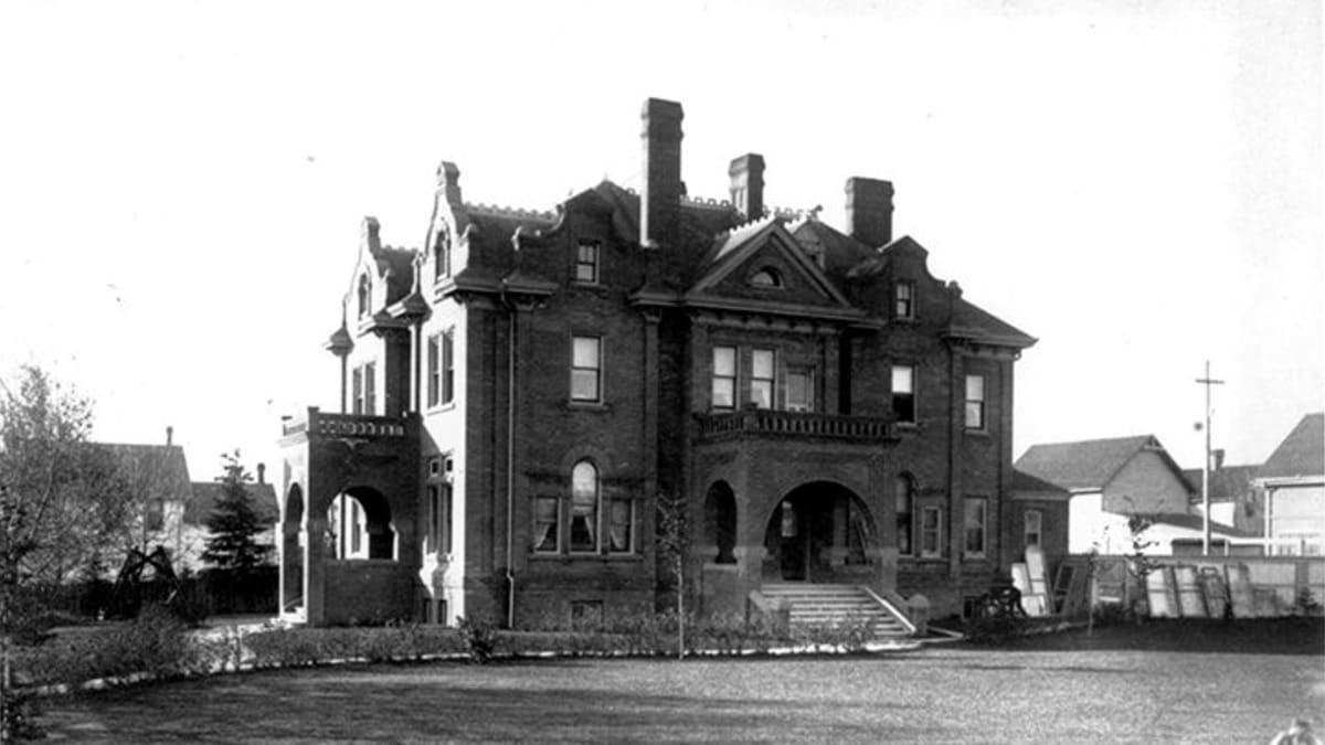 Exterior view of McDougall Mansion in Edmonton, showcasing its architectural features.